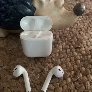 Two pairs of used Apple iPods